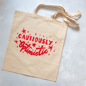 "CAUTIOUSLY OPTIMISTIC" - TOTE BAG BY FINEST IMAGINARY